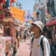 Pemandangan Hong Kong dengan Victoria Harbour saat matahari terbenam, feri cepat menuju Makau, dan arsitektur Portugis ikonik di Senado Square